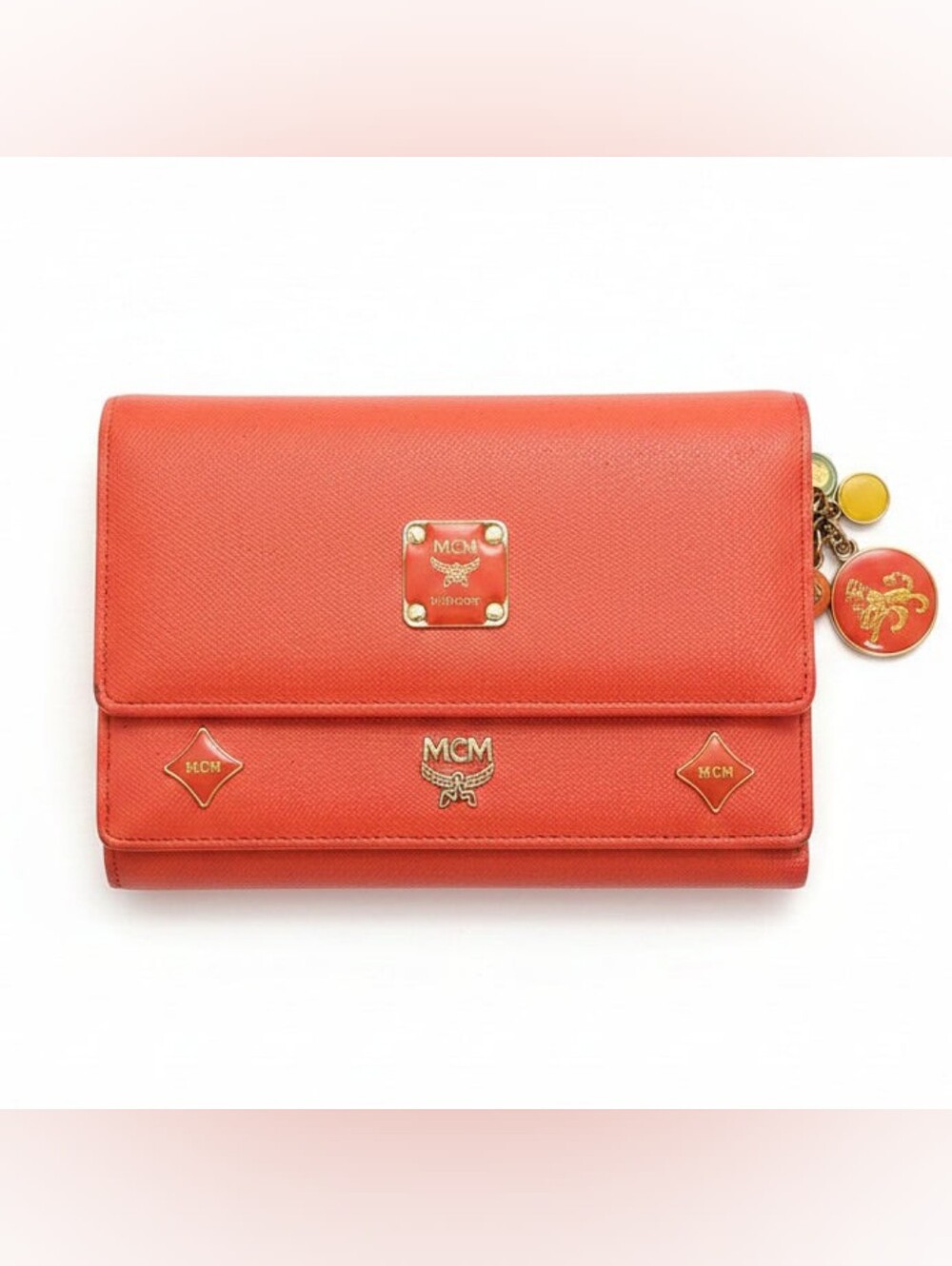 Authentic MCM Orange Saffiano Leather Charm Trifold Wallet